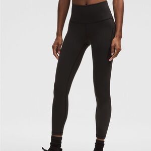 Black women’s high waisted lululemon leggings- POCKETS